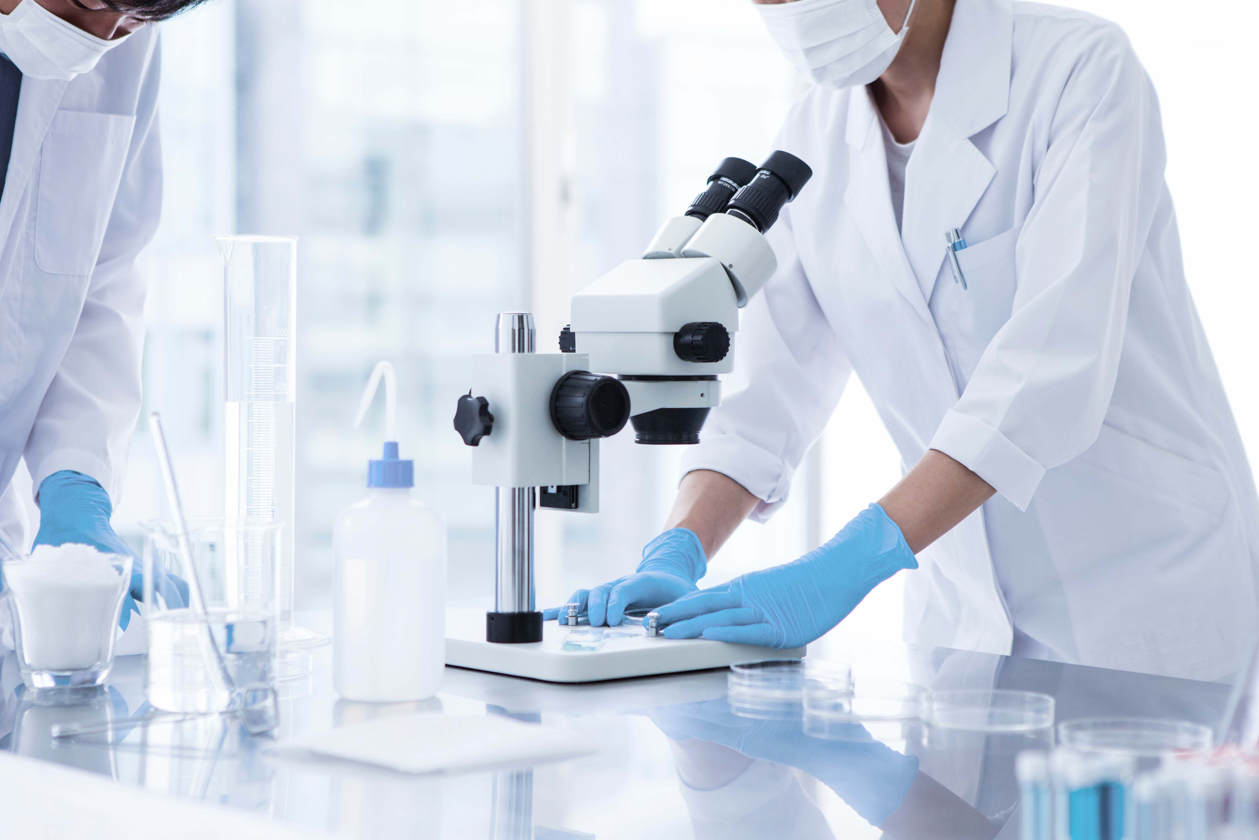 microscope and beakers